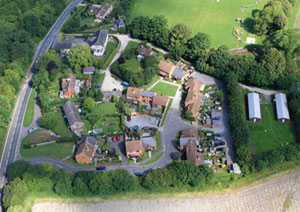 Ketchers Farm. The original farmhouse can be seen at the top, and the Recreation ground is immediately north of the development. 126